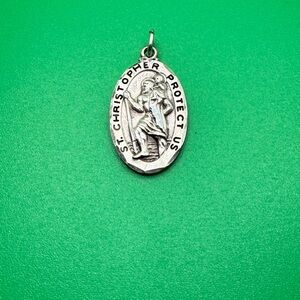 Sterling silver St Christopher pendant.